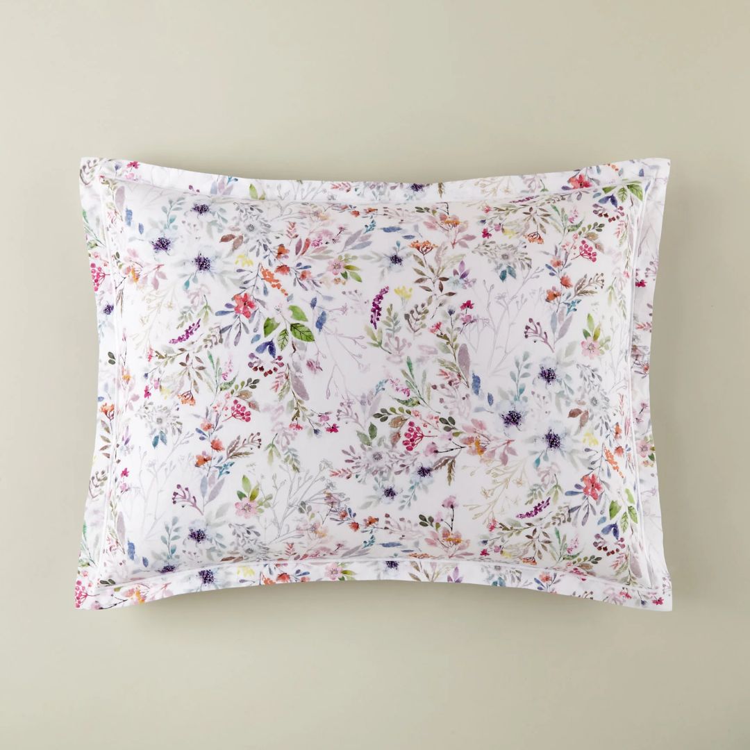 Floral patterned sham on a beige background