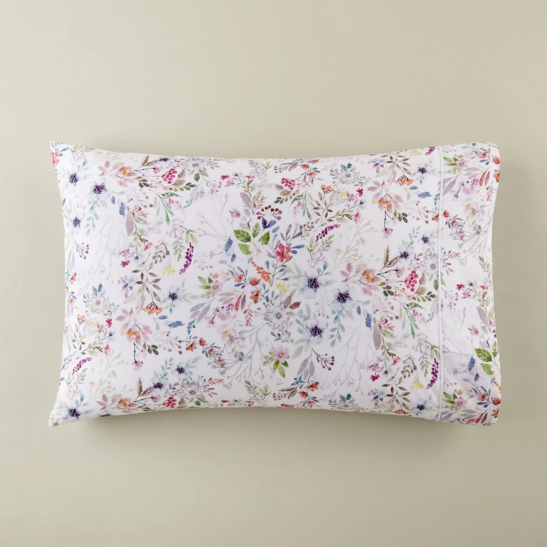 Floral patterned pillowcase on a beige background