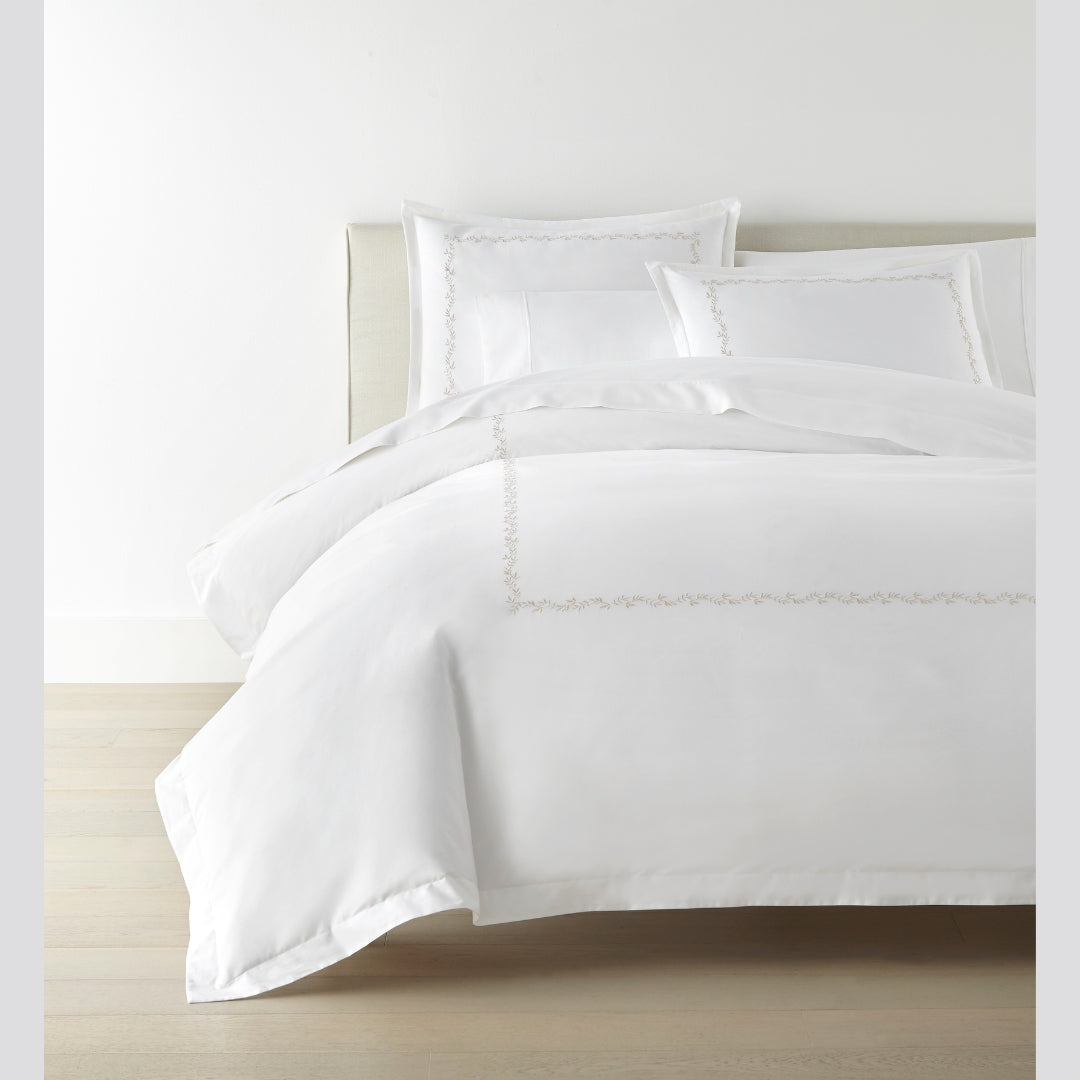 Peacock Alley Ivy Duvet Cover and Shams in Linen - side view of bed