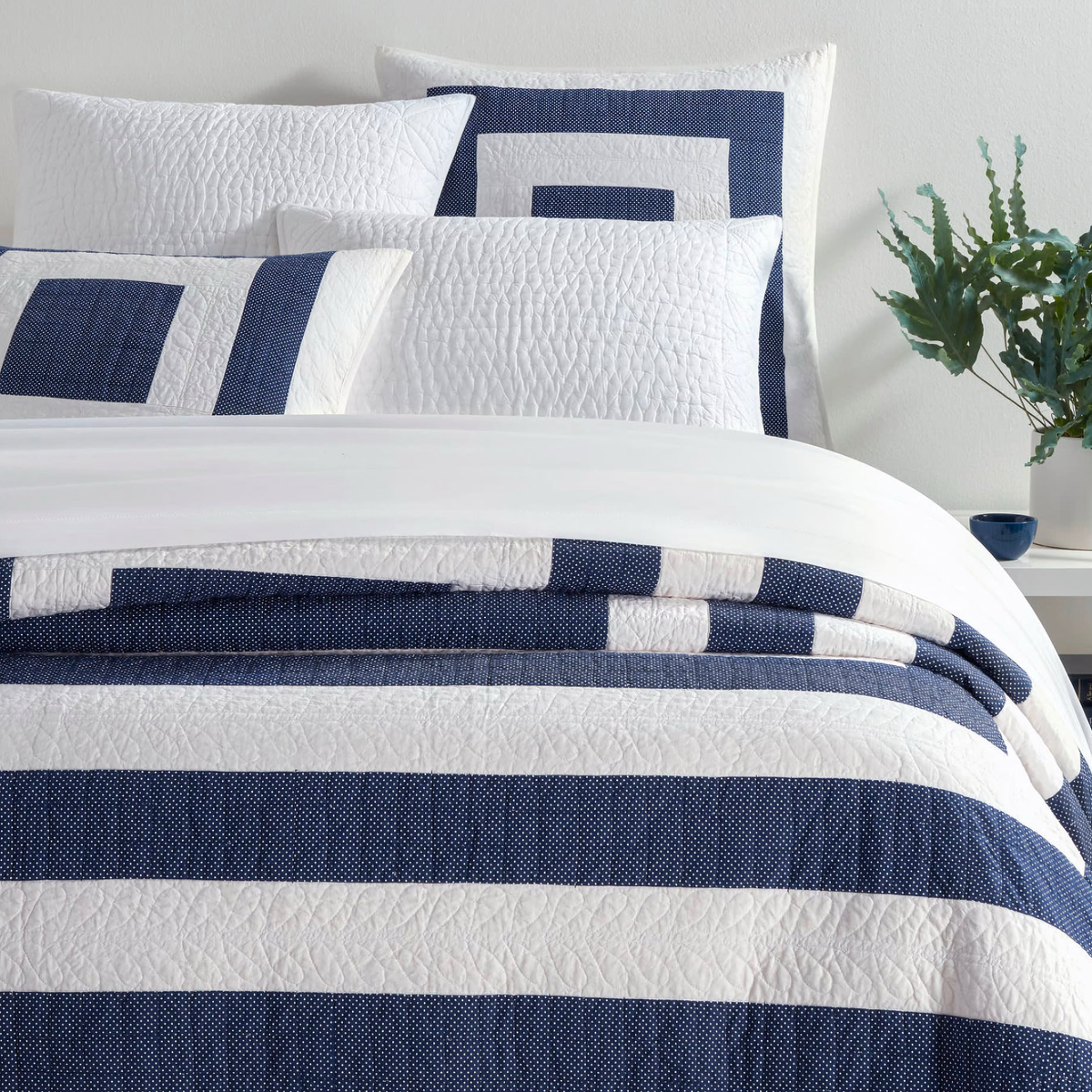 Closeup of Pine Cone Hill Birch Point Quilt and Shams in Navy