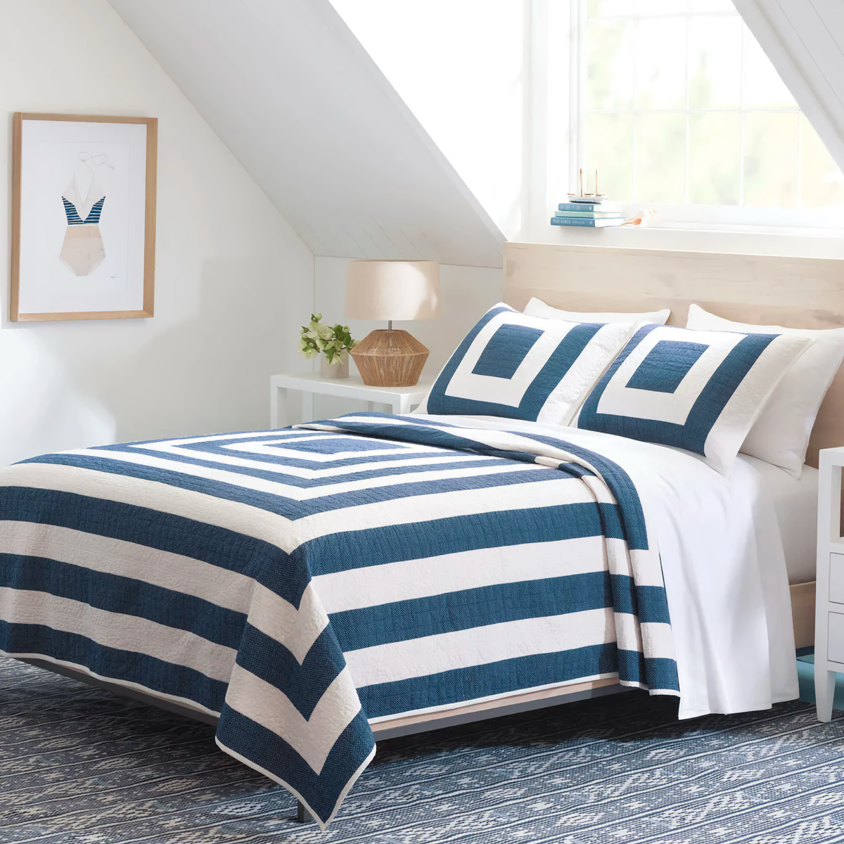 Corner View of Pine Cone Hill Birch Point Quilt and Shams in Navy