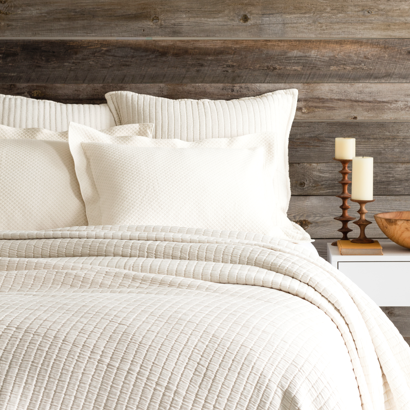 Closeup of Bed in Ivory Pine Cone Hill Boyfriend Matelassé Coverlet & Shams