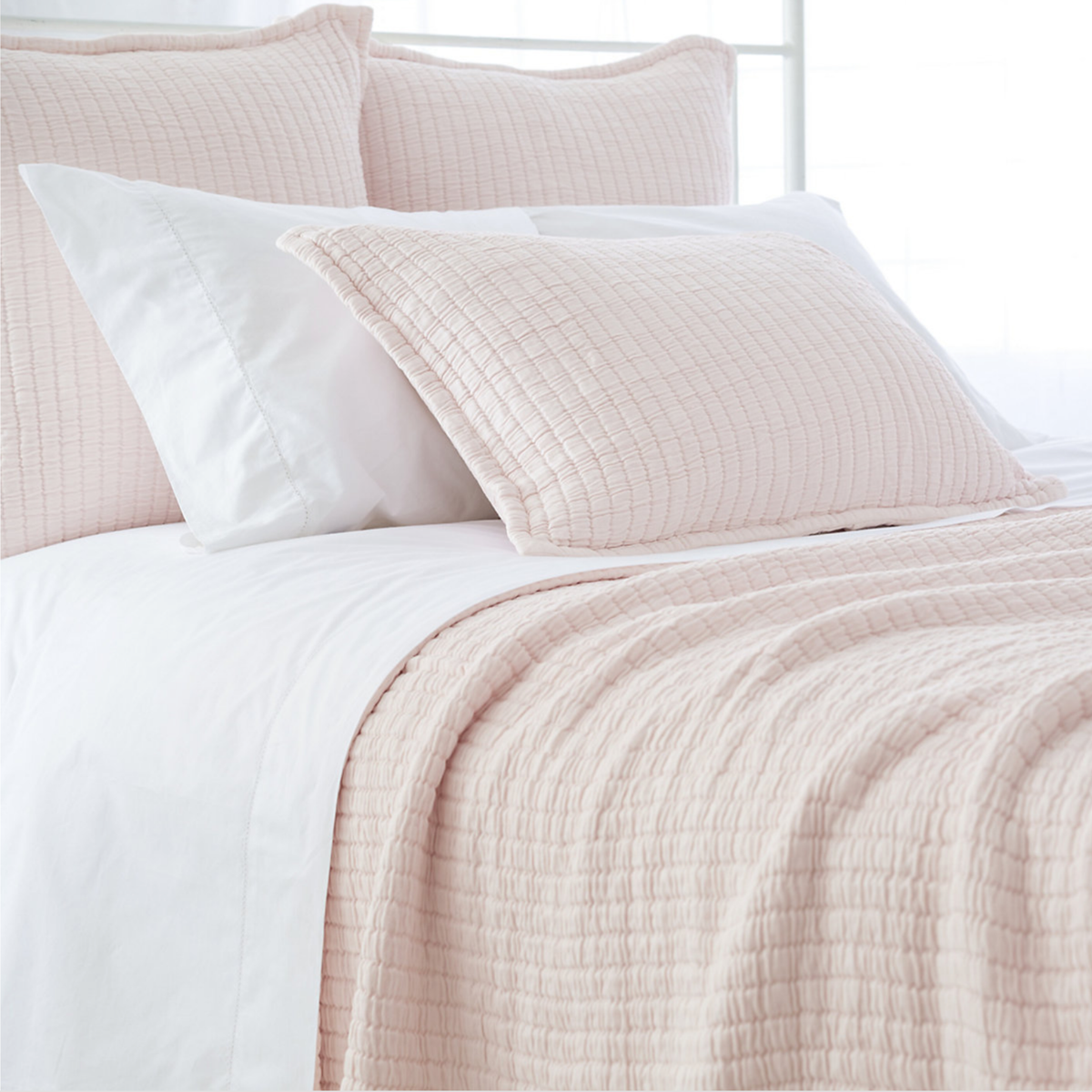 Closeup of Bed in Slipper Pink Pine Cone Hill Boyfriend Matelassé Coverlet &amp; Shams