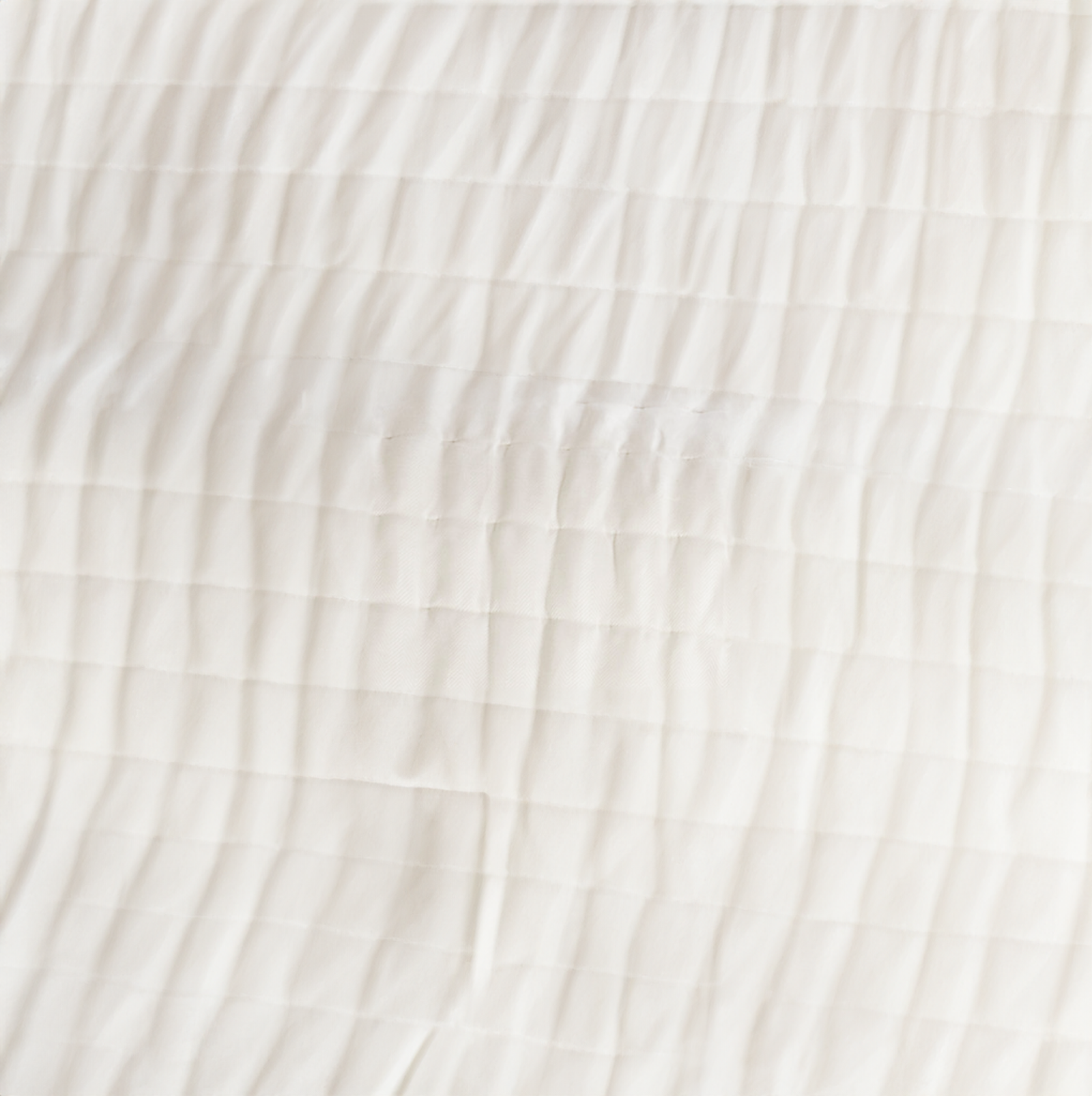 Stack of Pine Cone Hill Brussels Quilts