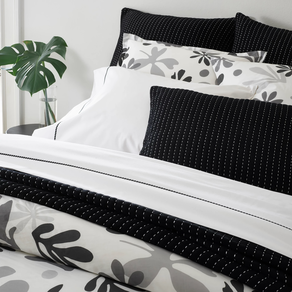 Closeup of Black Coordinates with Pine Cone Hill Dottie Bedding