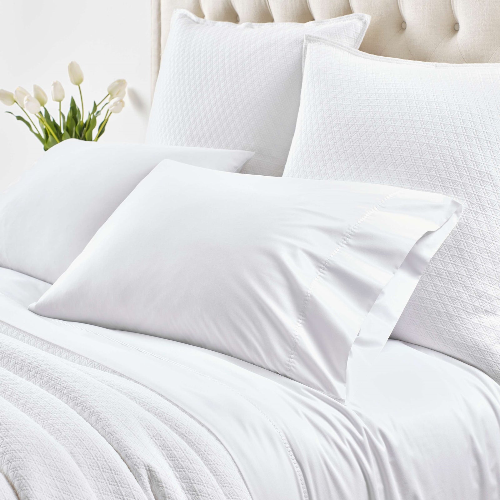 Lifestyle Image of Pine Cone Hill Dottie Bedding in White Color