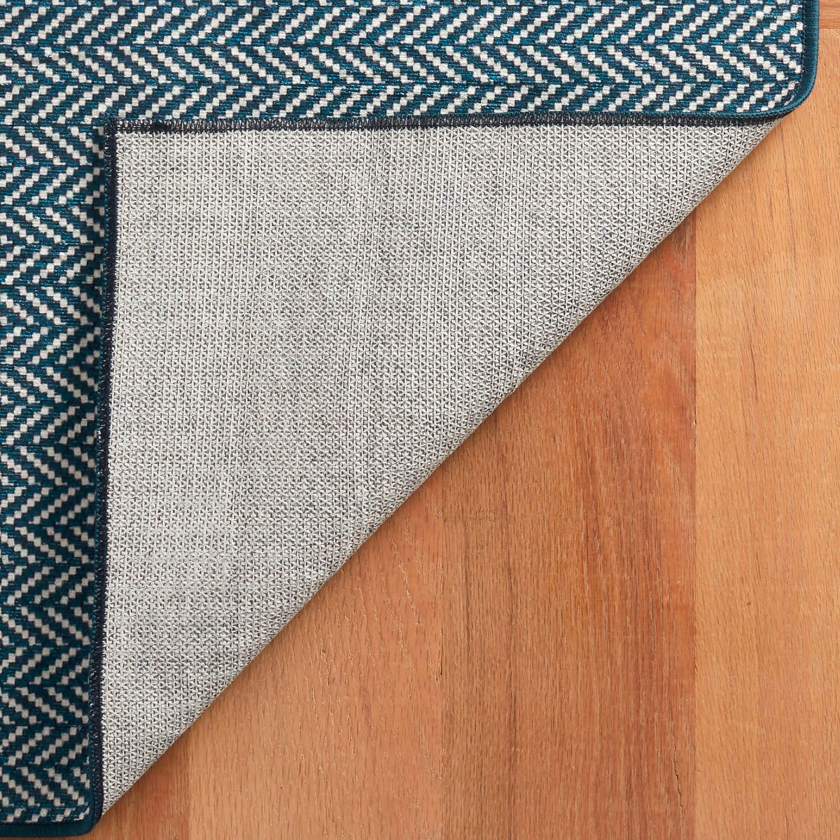 Folded Navy Pine Cone Hill Herringbone Machine Washable Rug