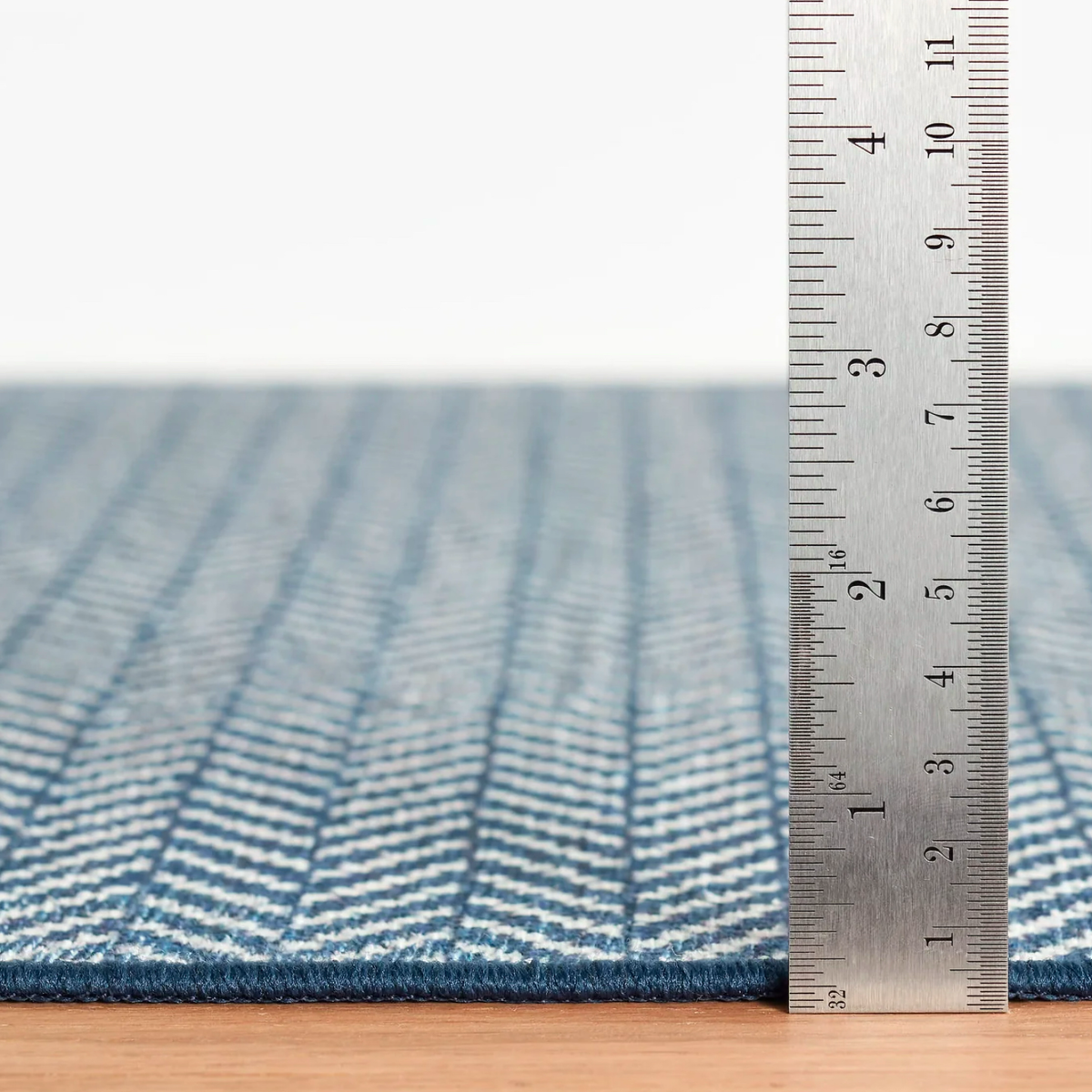 Thickness of Navy Pine Cone Hill Herringbone Machine Washable Rug