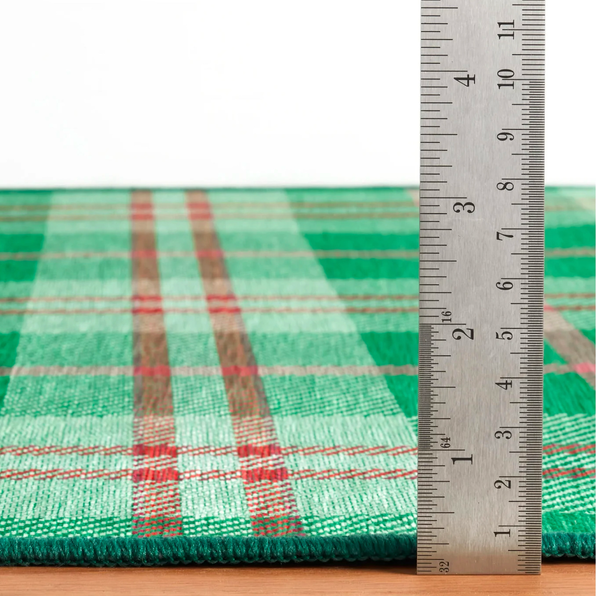 Thickness of Pine Cone Hill Jolly Plaid Machine Washable Rug in Green Color