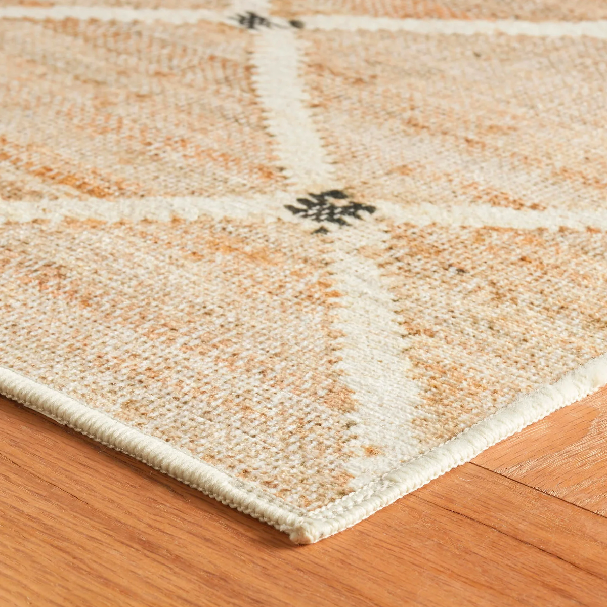 Corner of Pine Cone Hill Kali Machine Washable Rug in Natural