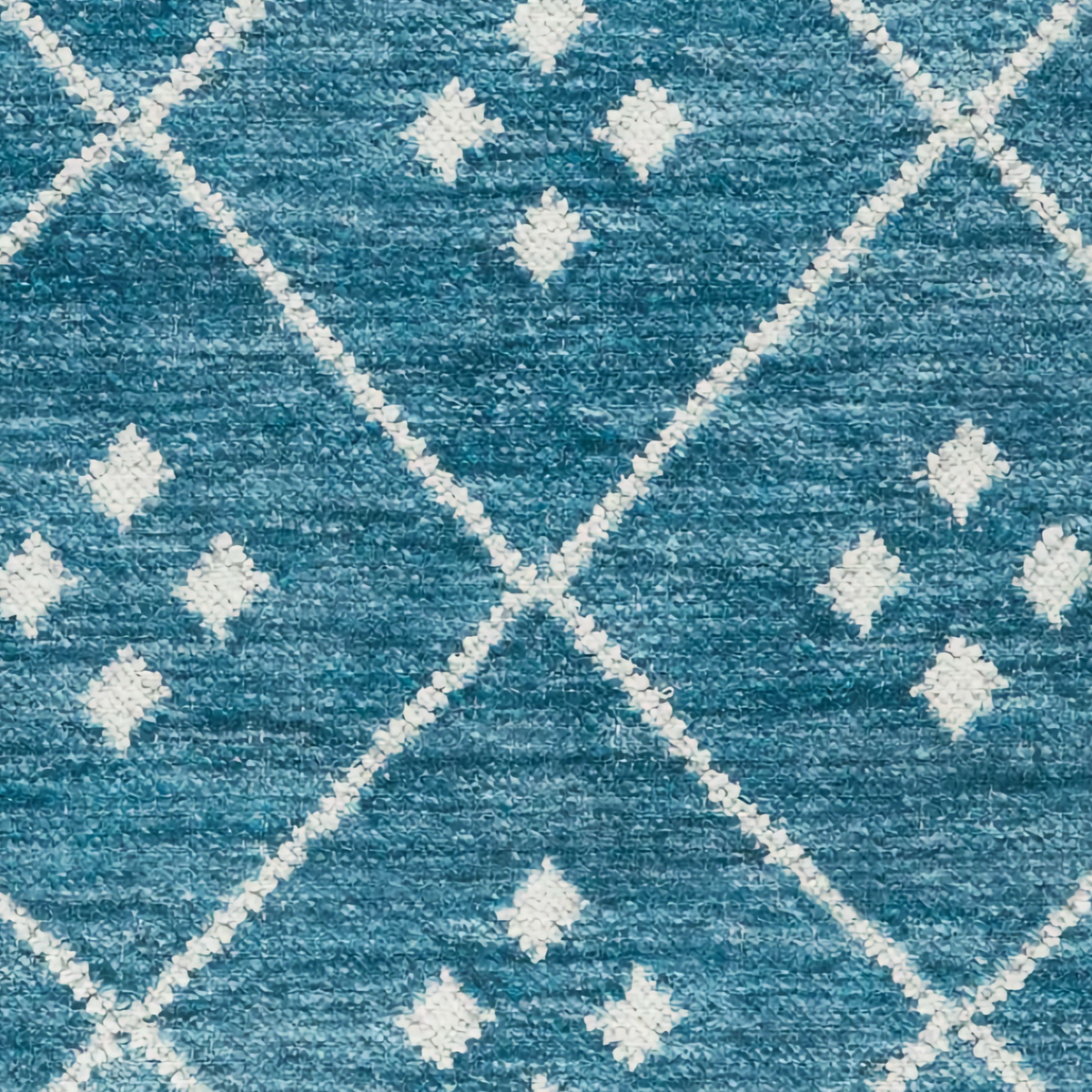 Fabric Closeup of Pine Cone Hill Kota Machine Washable Rug in Indigo