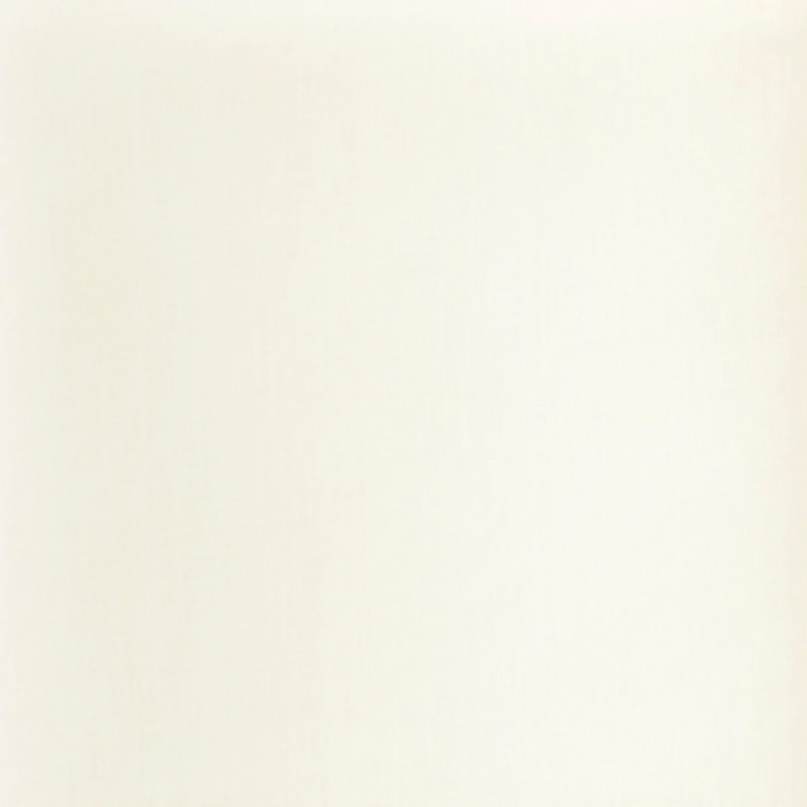 Closeup of Bed Dressed in Ivory Pine Cone Hill Lush Linen Bedding