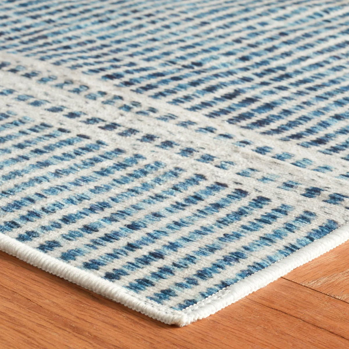 Corner of Pine Cone Hill Malta Machine Washable Rug in Blue