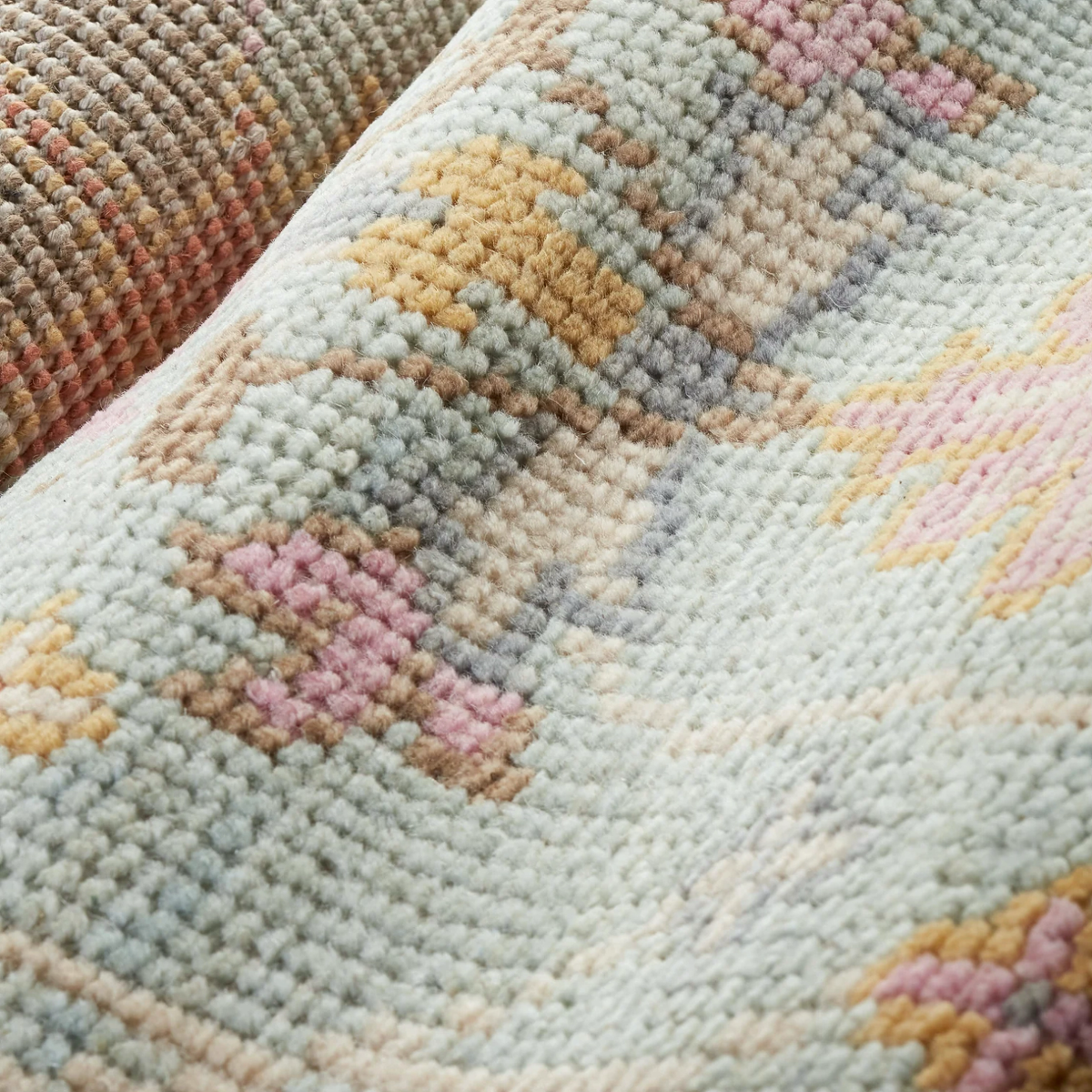 Closeup of Pine Cone Hill Masterpiece Rug Collection in Mara Design