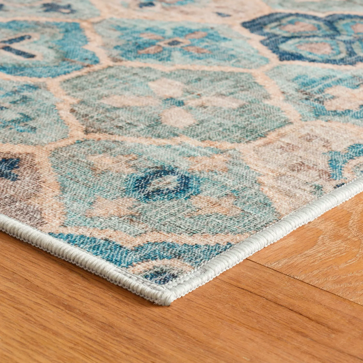 Corner of Blue Pine Cone Hill Pali Machine Washable Rug