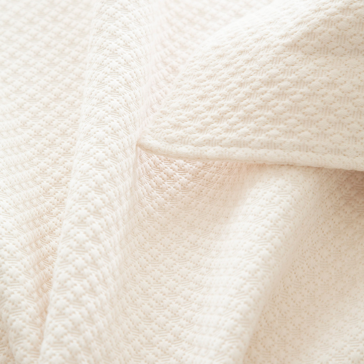 Close Up Image of Pine Cone Hill Petite Trellis Matelassé Coverlet and Shams in Ivory Color