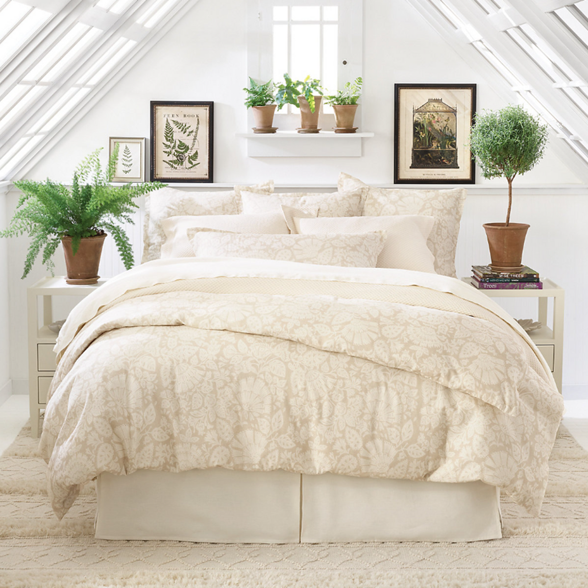 Lifestyle Image of Pine Cone Hill Petite Trellis Matelassé Coverlet and Shams in Ivory Color