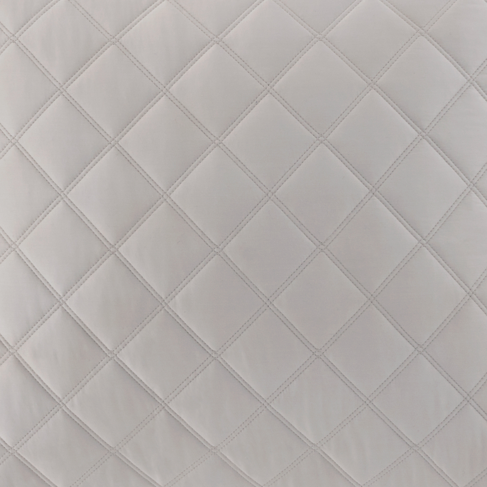 Closeup of Grey Pine Cone Hill Quilted Silken Solid Coverlet on Full Bed