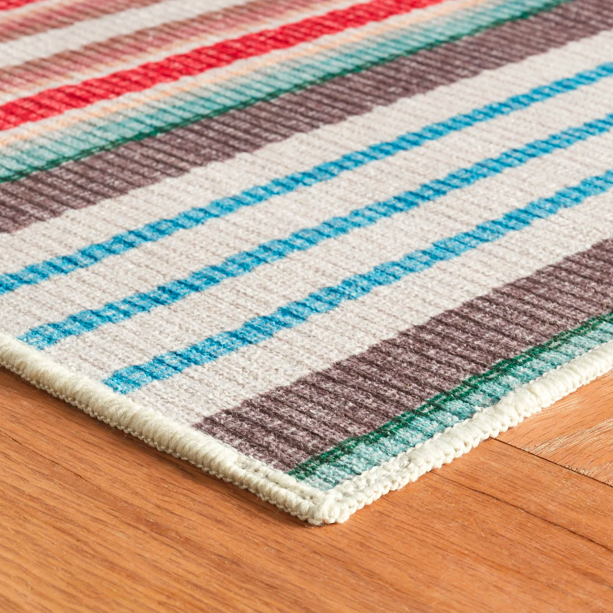 Corner of Pine Cone Hill Ranch Multi Stripe Machine Washable Rug