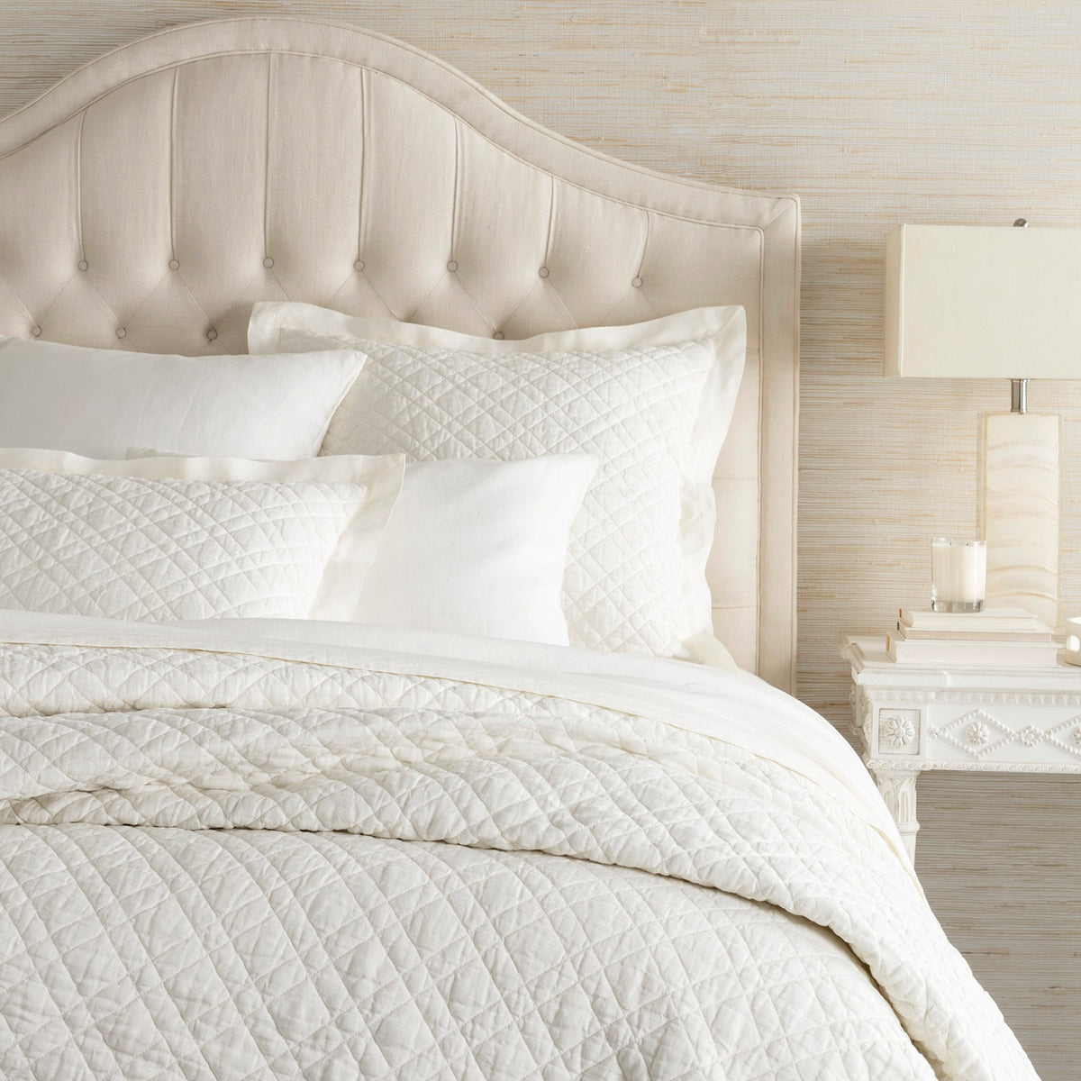 Corner Shot of Pine Cone Hill Washed Linen Quilted Bedding in Color Ivory