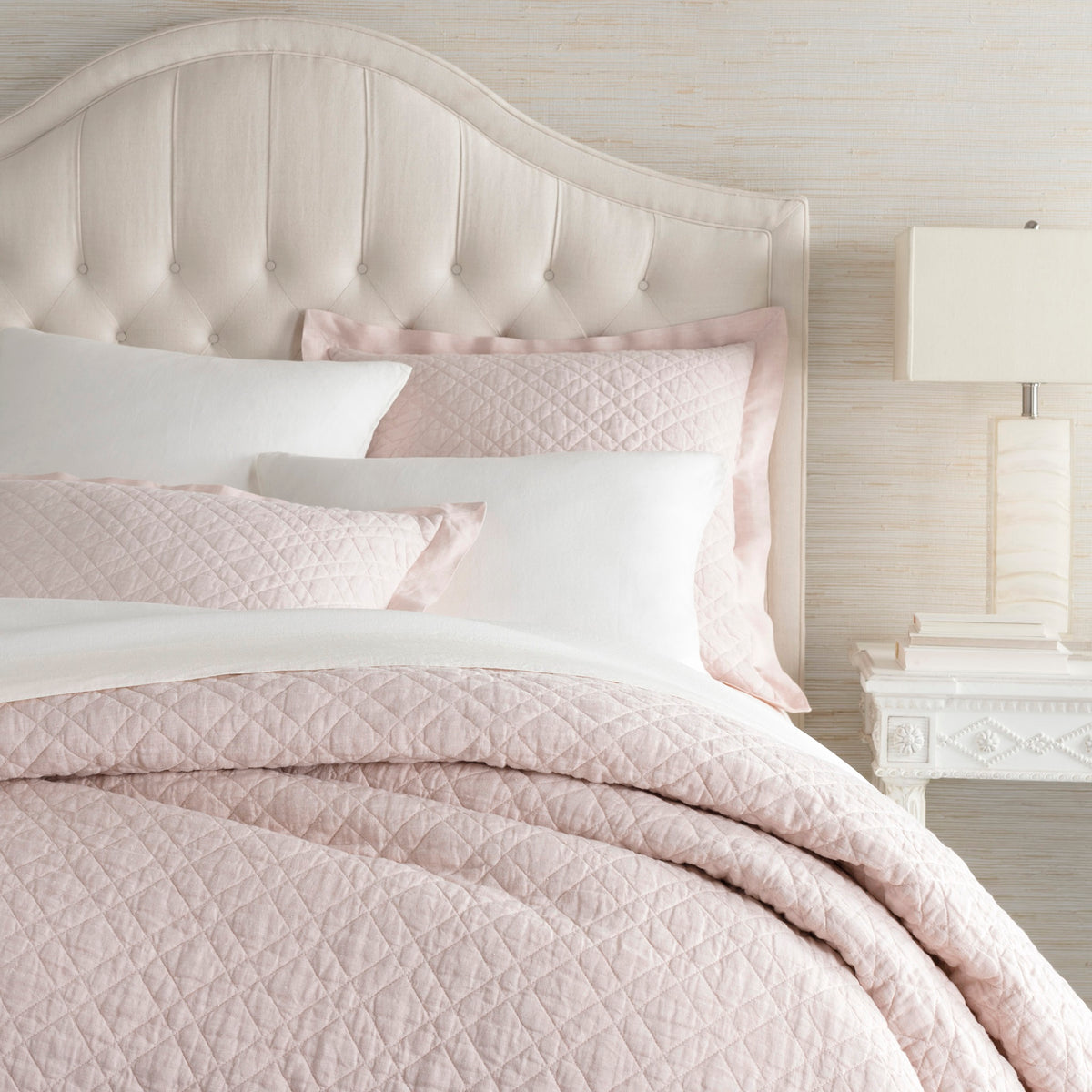 Corner Shot of Pine Cone Hill Washed Linen Quilted Bedding in Color Slipper Pink