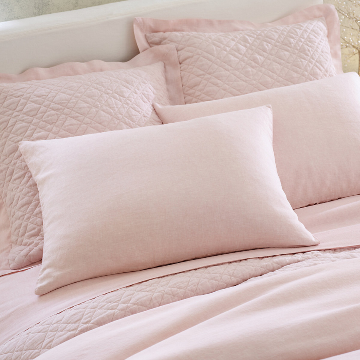 Close Up Image of Pine Cone Hill Washed Linen Quilted Bedding in Slipper Pink Color