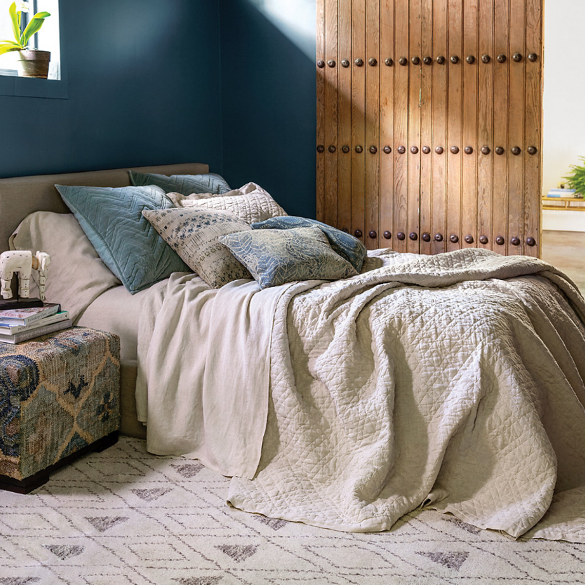 Lifestyle Image of Pine Cone Hill Washed Linen Quilted Bedding in Natural Color