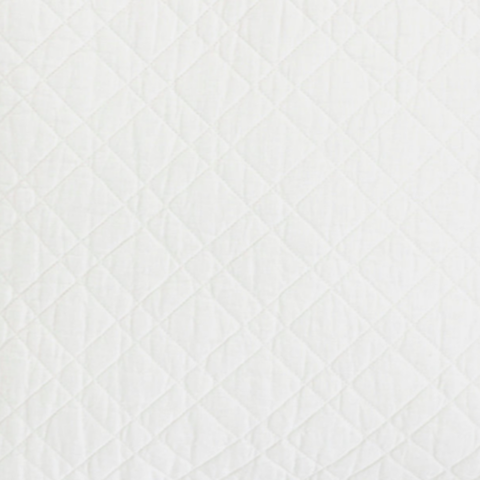 Corner Shot of Pine Cone Hill Washed Linen Quilted Bedding in Color Ivory