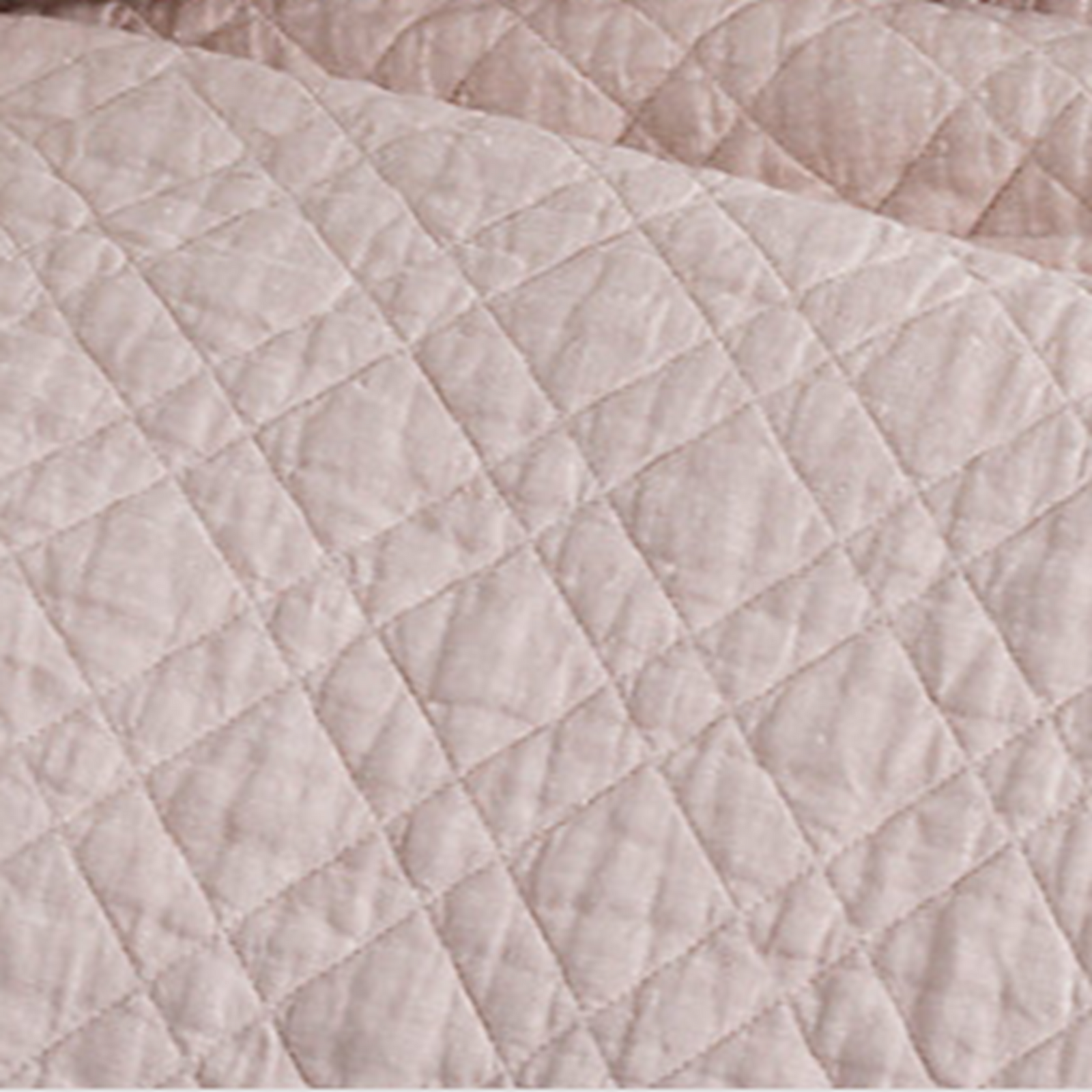 Corner Shot of Pine Cone Hill Washed Linen Quilted Bedding in Color Slipper Pink