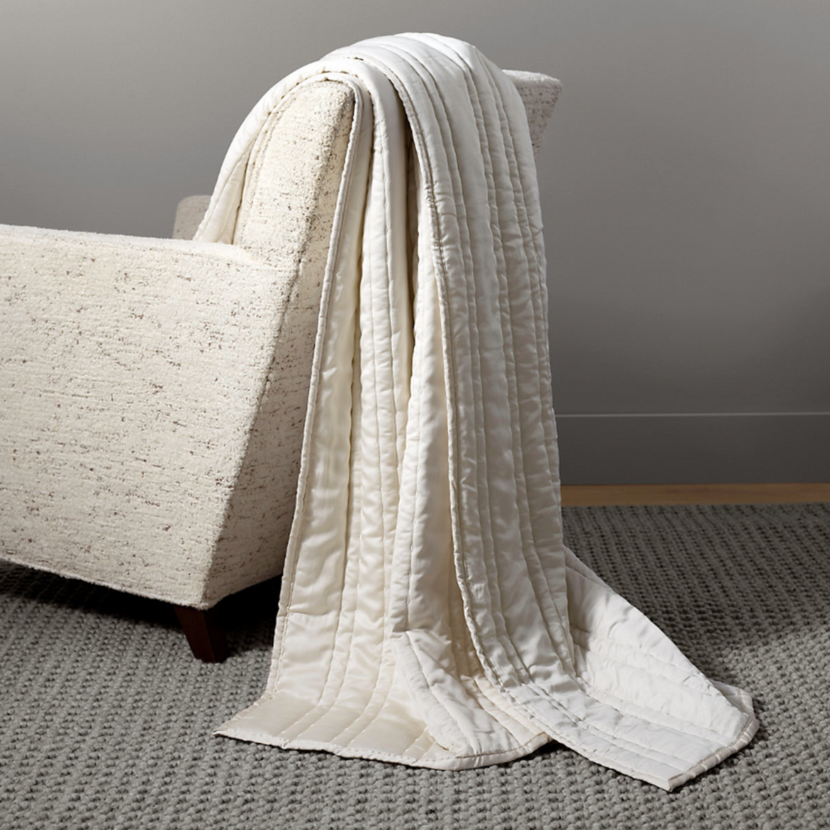 Lifestyle Image of Pine Cone Hill Blissful Bamboo Throw in Pearl/Silver