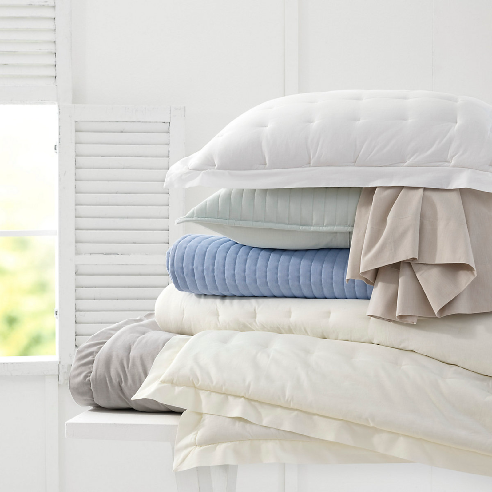 Stack of Pine Cone Hill Cozy Cotton Puff Bedding in Different Colors