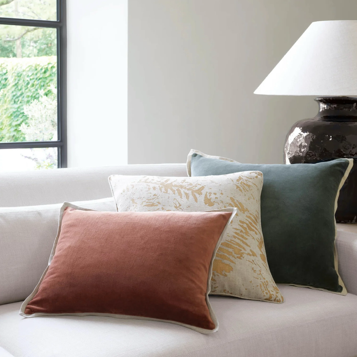 Stack of Pillows with Pine Cone Hill Marie Flanagan Gehry Velvet/Linen Decorative Pillows in Everglade and Russet