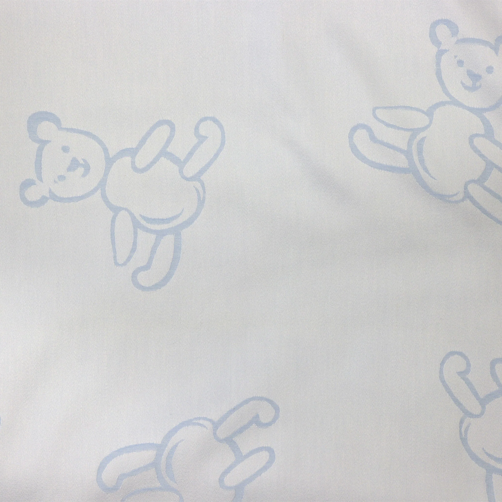 Closeup of SDH Bear Baby Bedding with Light Blue Swatch