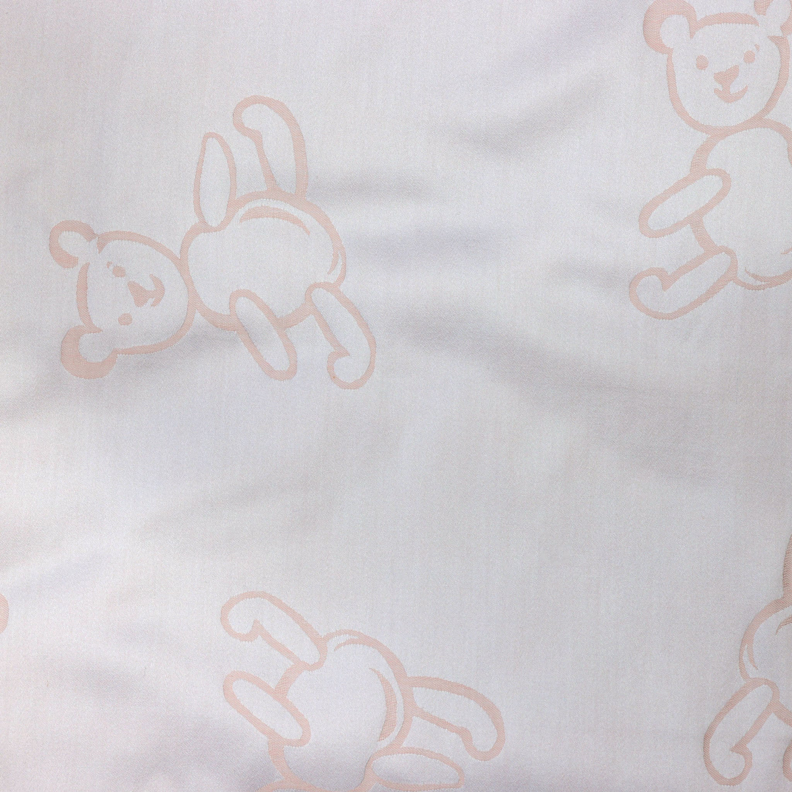 Closeup of SDH Bear Baby Bedding with Rosewater Swatch
