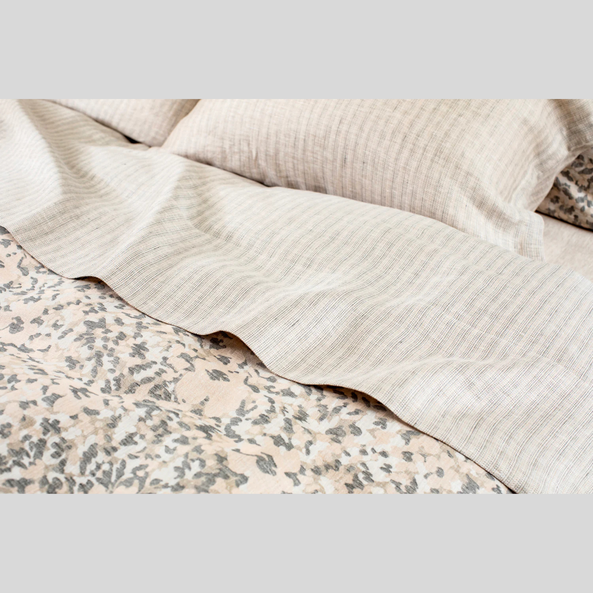 Closeup of SDH Carlisle Bedding in Galah pattern