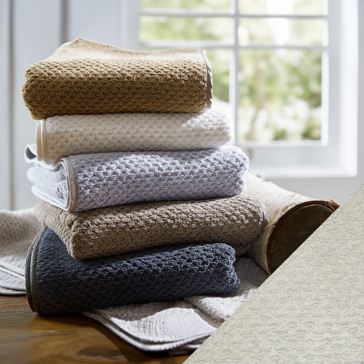 Stack of SDH Checkmate Bath Towels and Mats with Stucco Swatch