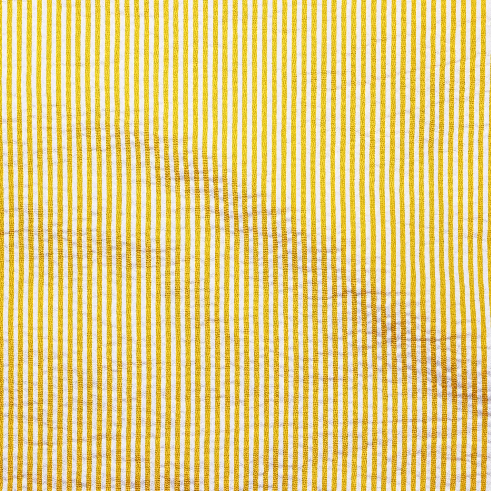 Stack of SDH Elba Bedding Shams with Straw Swatch