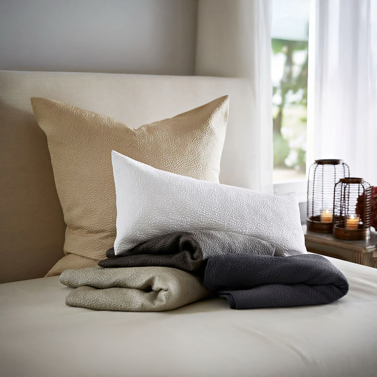 SDH Jazz Parchment european decorative pillow, Jazz Snow 12" x 24" decorative pillow, and (left to right) Jazz Steal, Jazz Caviar and Jazz Indigo covers.