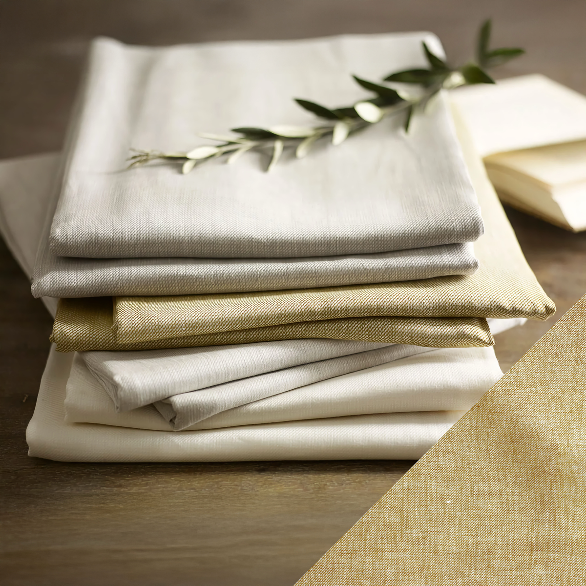 Stack of SDH Kent Bedding with Dijon Swatch