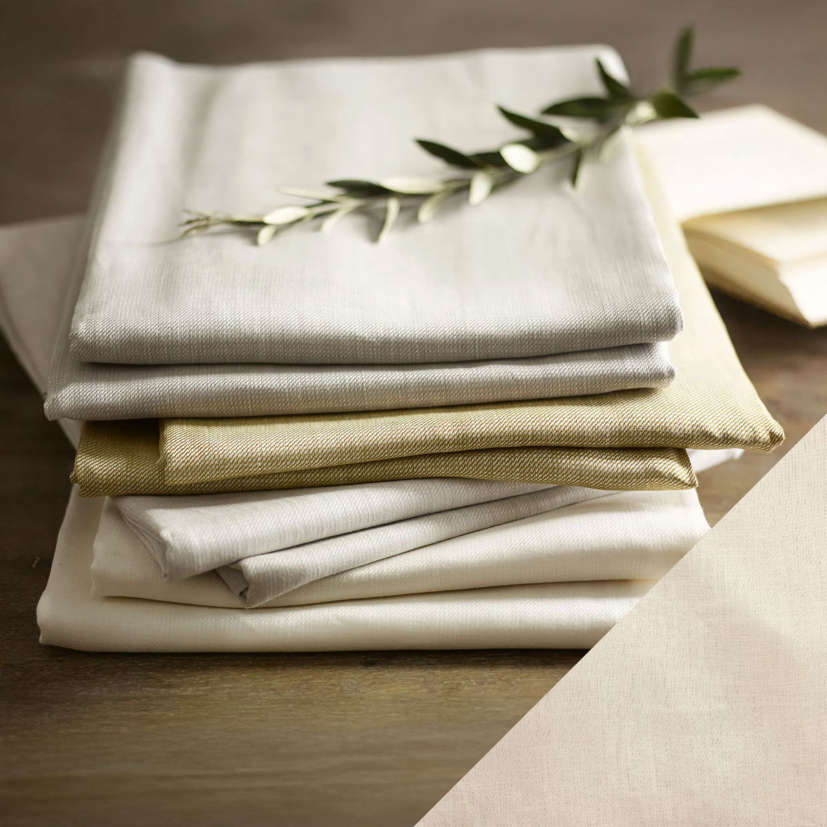 Stack of SDH Kent Bedding with Stucco Swatch