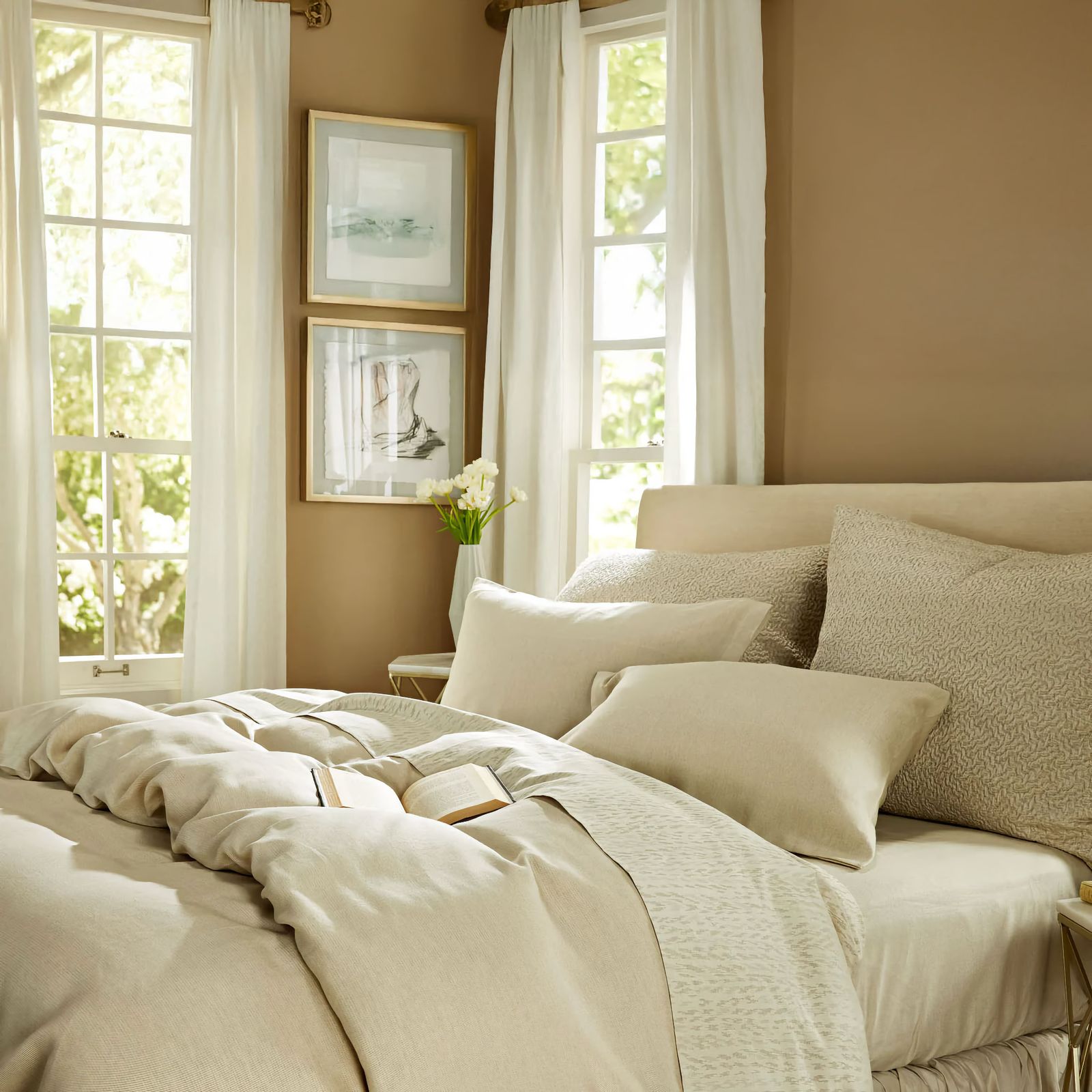 Kent by The Purists duvet cover, standard pillows and fitted sheet, Milos by The Purists top sheet, and Allegro Platinum by The Purists large decorative pillows.