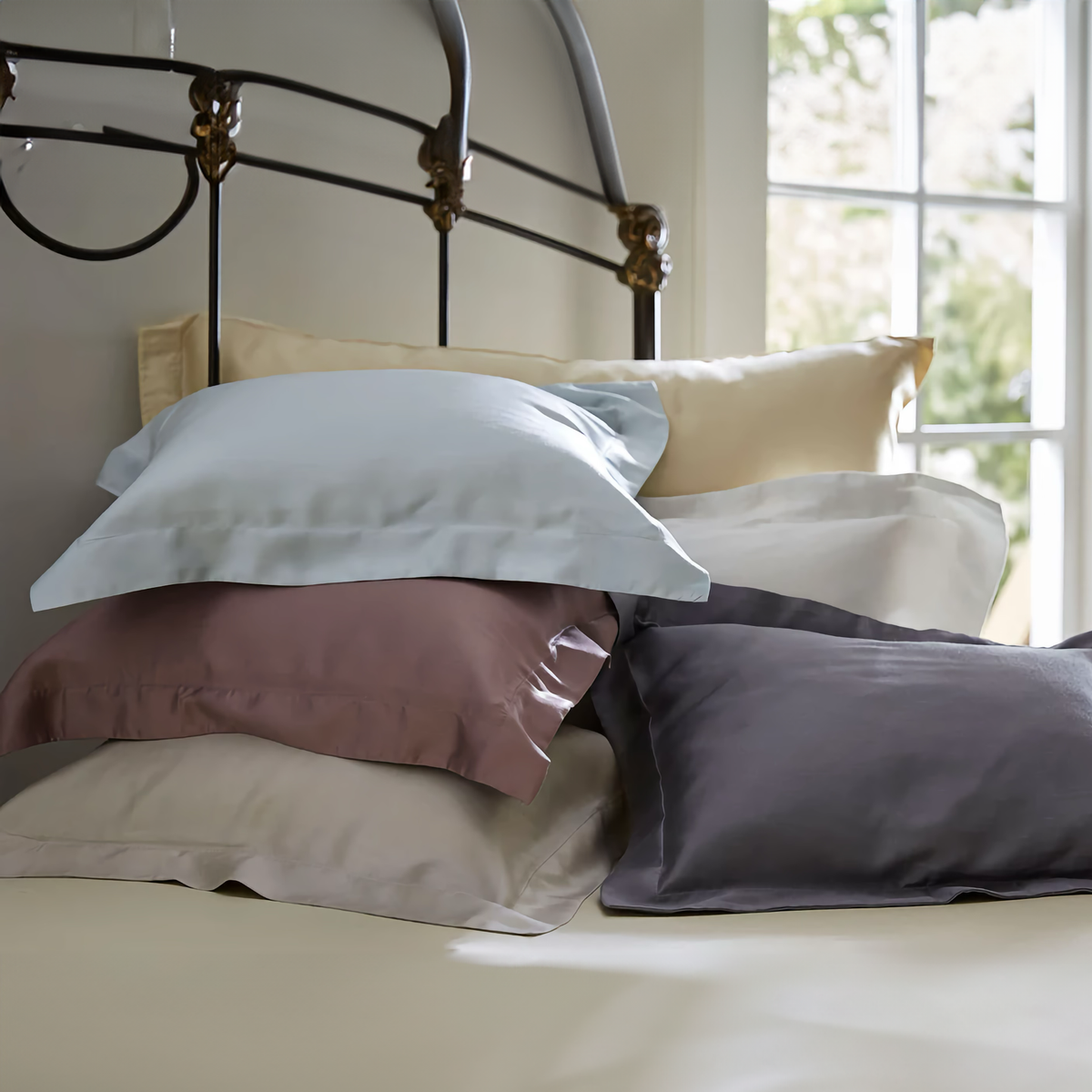 Stack of SDH Legna Classic Bedding Shams in different colors