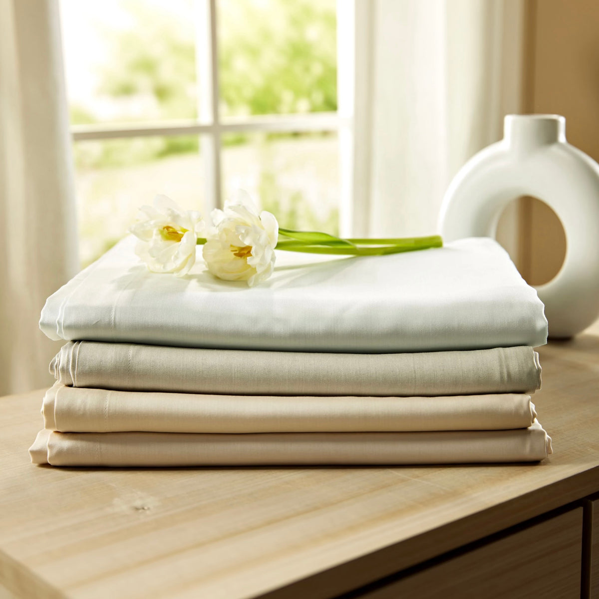 SDH Legna Dahlia Bedding available in seashell, paradise, almond, pewter and biscotti colors