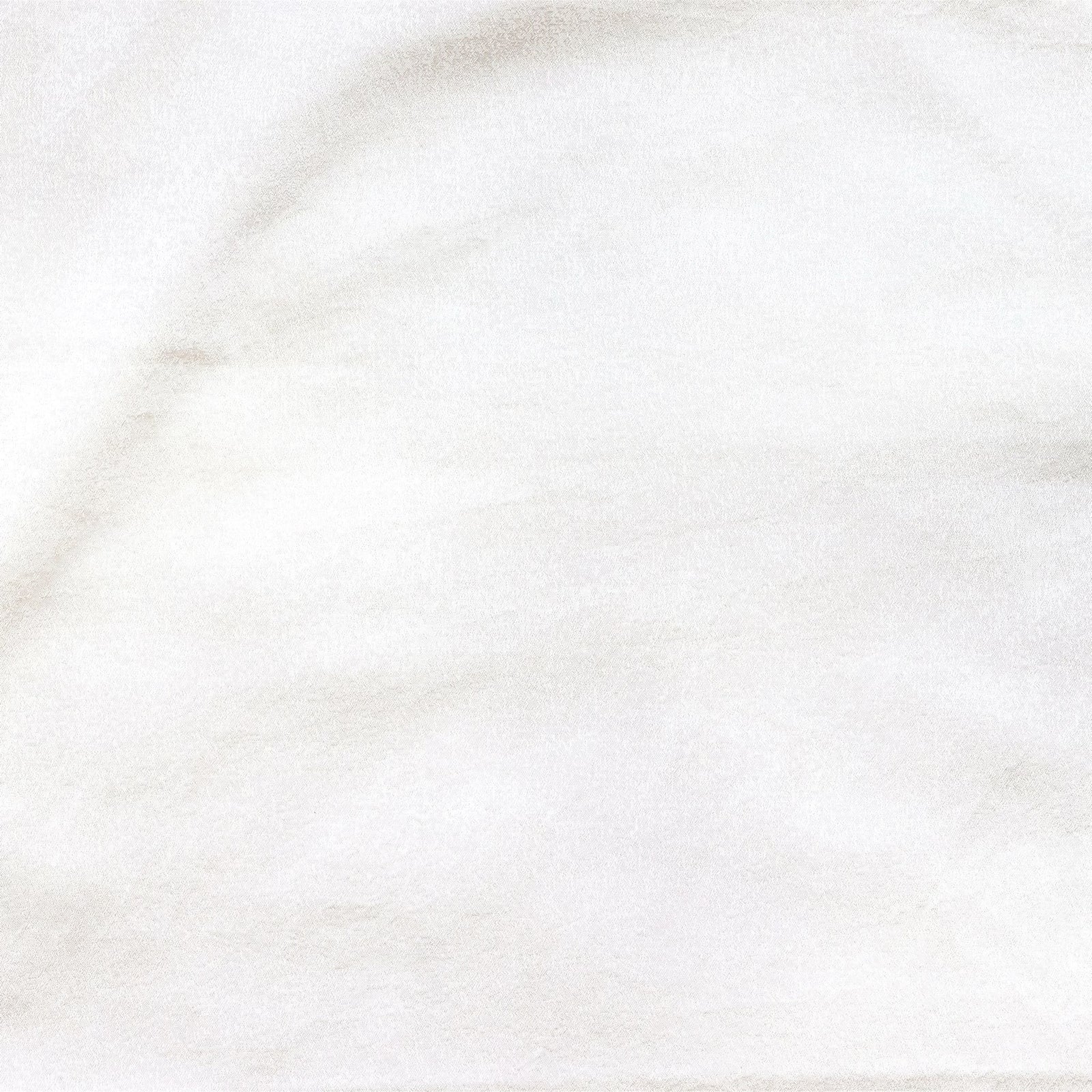 Patina Snow sheeting and standard pillows, Koji Driftwood european decorative pillows, and Kenji Driftwood duvet cover