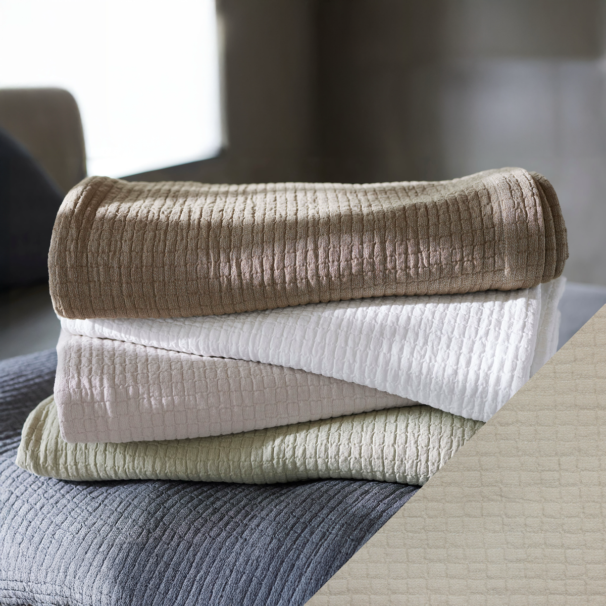 Stack of SDH Piani Bedding with Latte Swatch