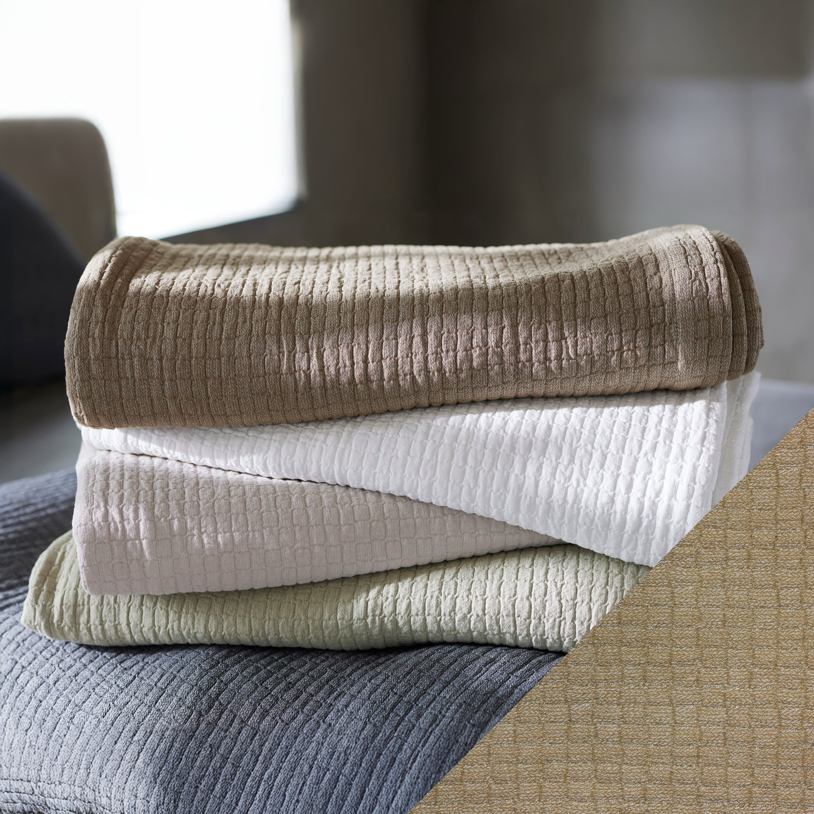 Stack of SDH Piani Bedding with Oregano Swatch