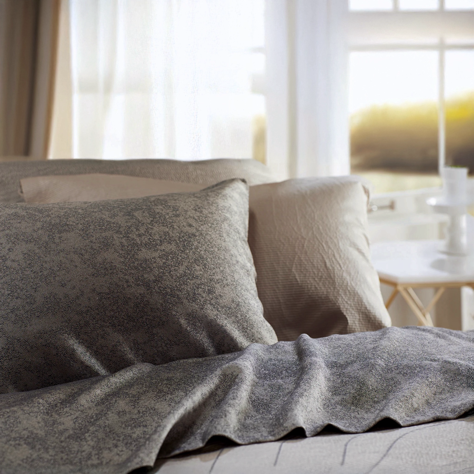 Speckle Ash top sheet & standard pillow, Shutter Sahara standard pillow, Zoya Ash duvet cover 