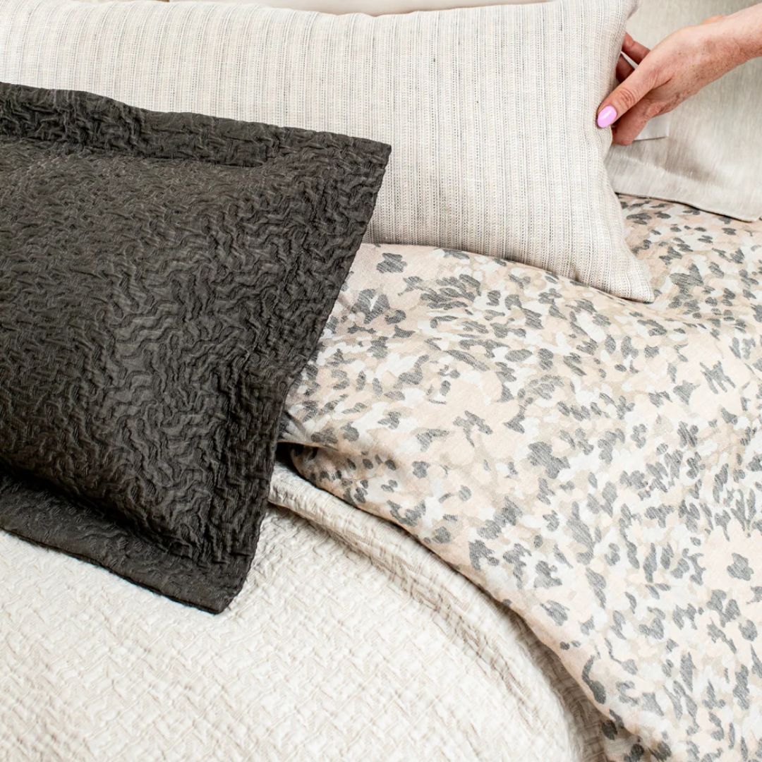 SDH Darby duvet cover shown with Allegro Caviar and Carlisle Galah pillows. Eton Marzipan coverlet on top of the Darby duvet cover.