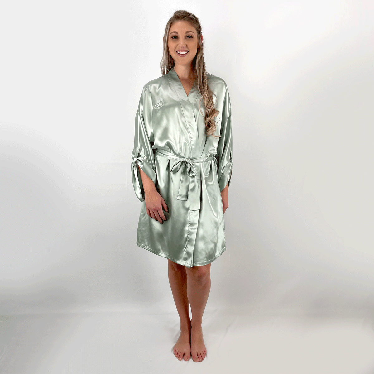 Model wearing a pure silk kimono robe, showcasing its soft texture from various angles in a GIF