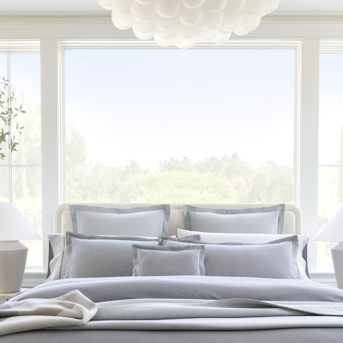 Front View of Bed with Scandia Home Alistair Bedding in Cielo color